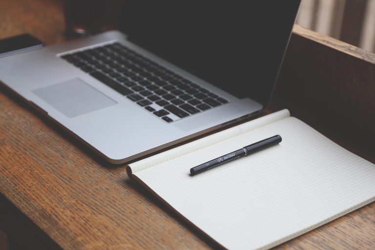 Desk, laptop, notebook — "Doral Window Replacement: Enhance Energy Efficiency and Aesthetics"